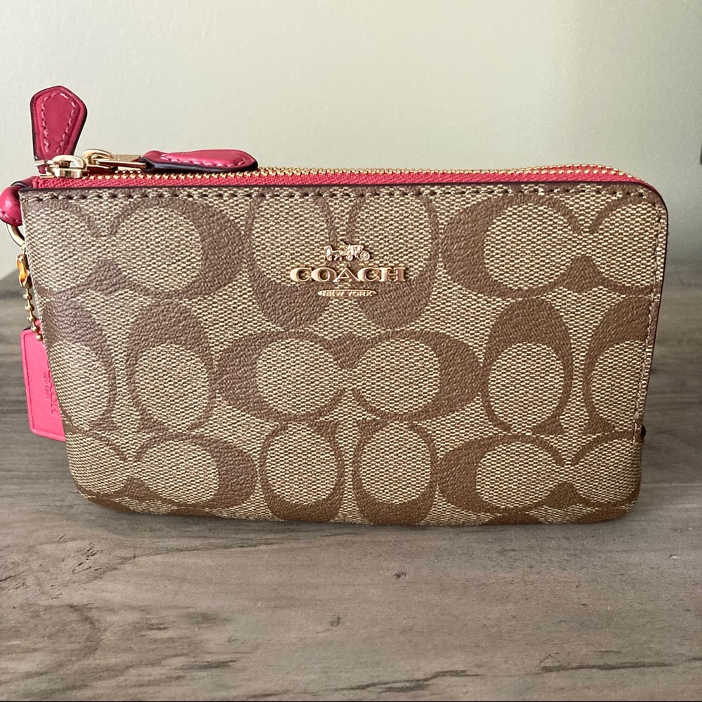 COACH Corner Zip Wristlet in Pink